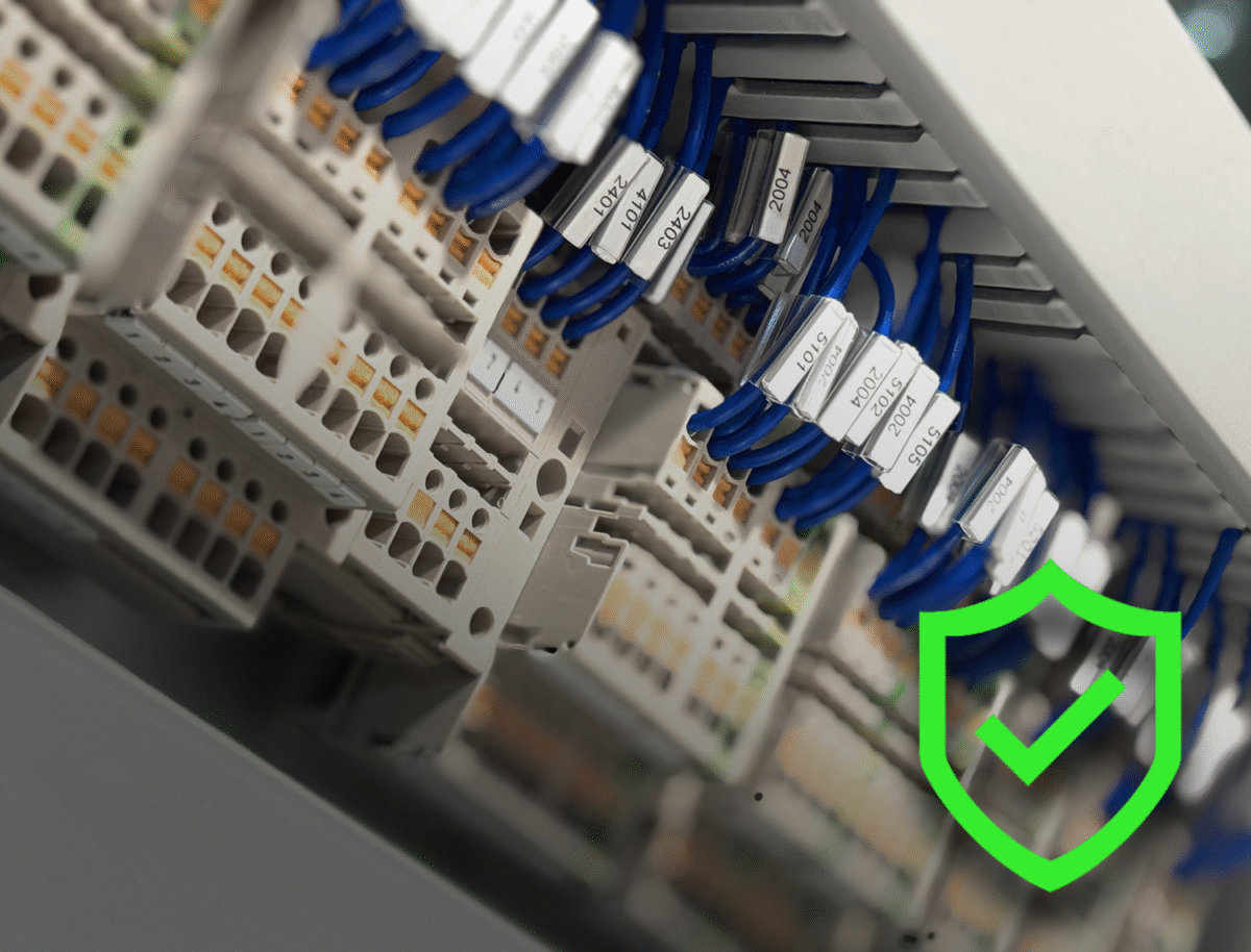 Neatly wired industrial control panel with PLC, relays, and labeled components designed for reliable machine control.